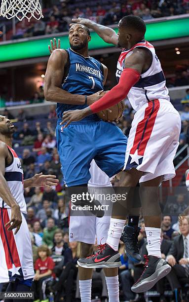 Minnesota Timberwolves power forward Derrick Williams drives to the basket against Minnesota Timberwolves point guard Ricky Rubio during the first...