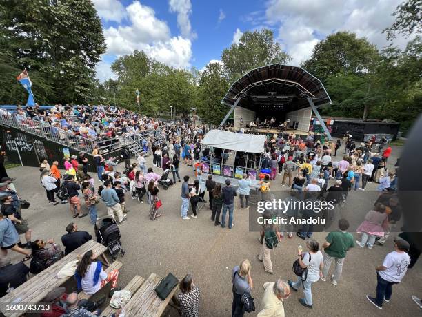 Citizens watch an open air concert on a sunny day at Vondelpark of the capital city Amsterdam, Netherlands on July 30, 2023. Vondelpark, which is...