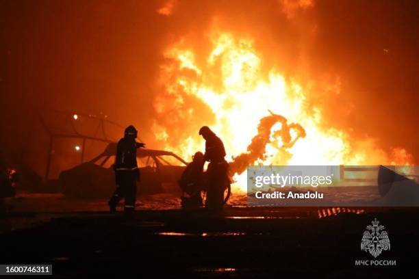 Firefighters continue to work at site after an explosion at a gas station in Makhachkala, Dagestan, Russia on August 15, 2023.The number of...