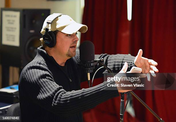 Storme Warren, host of SiriusXM's "The Highway" talks to members of country rock band "Parmalee" at SiriusXM Studios on January 25, 2013 in New York...