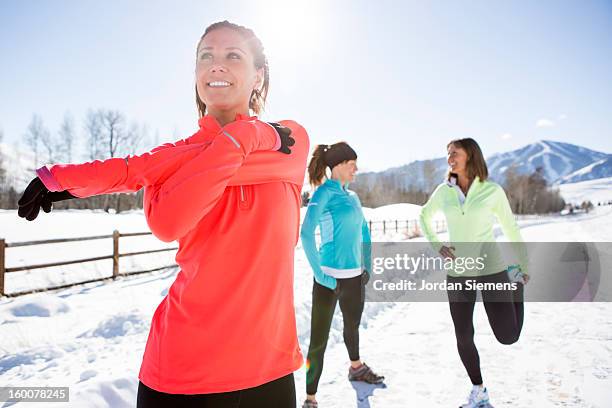 running in the winter. - winter running stock pictures, royalty-free photos & images