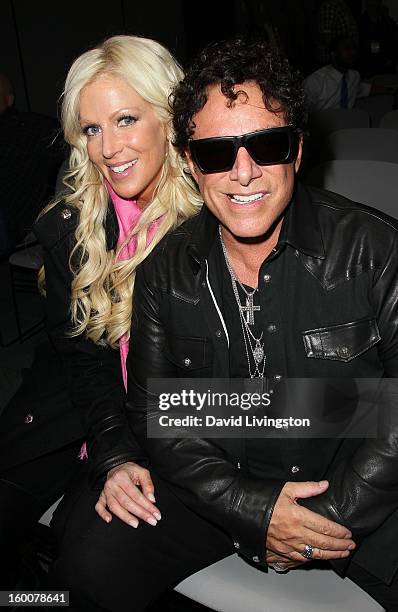 Recording artist Neal Schon and Michaele Salahi attend the 2013 NAMM Show - Day 2 at the Anaheim Convention Center on January 25, 2013 in Anaheim,...