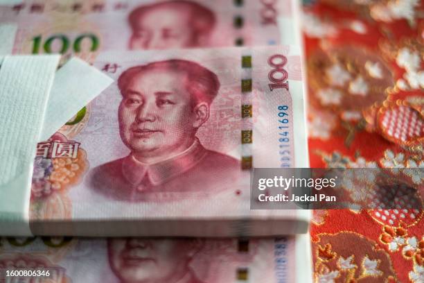 chinese cny money in 100 rmb bills - economy icon stock pictures, royalty-free photos & images