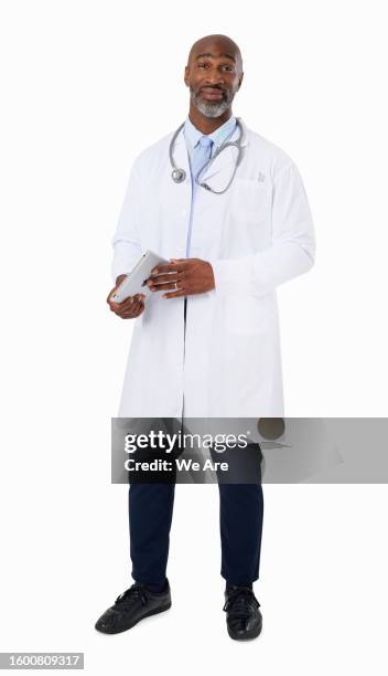portrait of smiling doctor - full length stock pictures, royalty-free photos & images