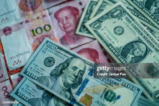 usd and rmb - yuan symbol stock-fotos und bilder