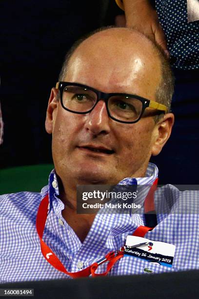 Host David Koch watches the final match between Victoria Azarenka of Belarus and Na Li of China during day thirteen of the 2013 Australian Open at...