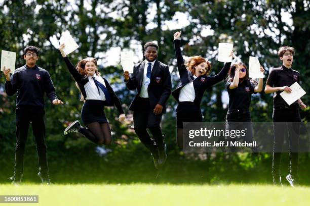 Pupils at Craigmount High celebrate receiving the results of the Scottish Qualifications Authority exam on August 8, 2023 in Edinburgh, Scotland....