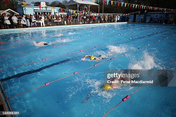 Competitors take part in the UK Cold Water Swimming Championships at Tooting Bec Lido on January 26, 2013 in London, England. Open to all comers the...