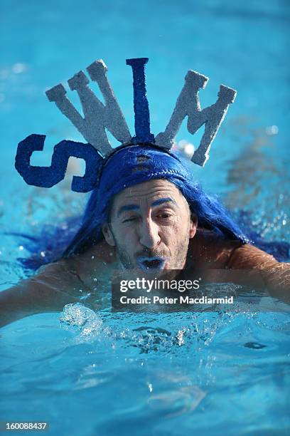 Competitor Jonathan Buckley wears a home made hat as he takes part in the UK Cold Water Swimming Championships at Tooting Bec Lido on January 26,...