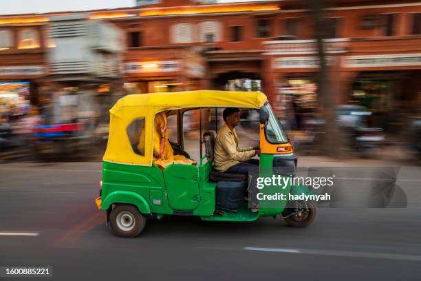 indian man drives auto rickshaw (tuk-tuk), india - motorriksha bildbanksfoton och bilder