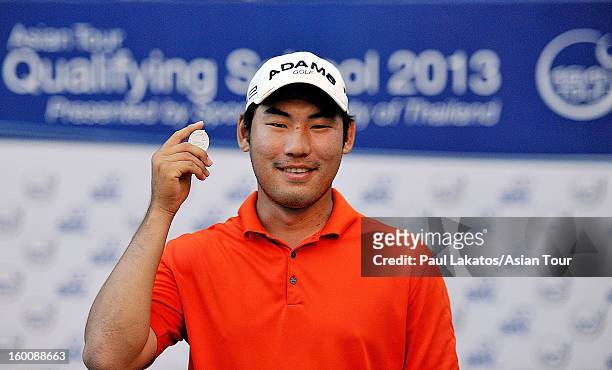 Chan Kim of USA, poses after winning the Asian Tour Qualifying final stage at Springfield Royal Country Club on January 26, 2013 in Hua Hin, Thailand.