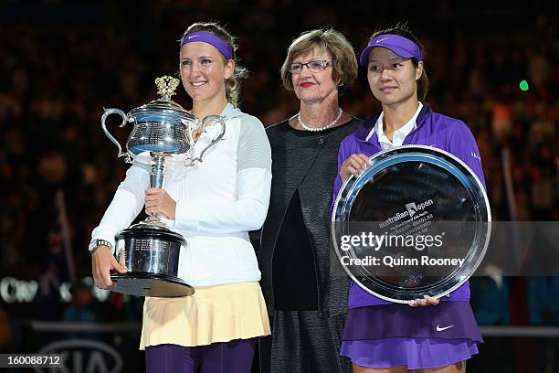Margaret Court poses with Victoria Azarenka of Belarus with the Daphne Akhurst Memorial Cup and Na Li of China with the runners up trophy after their...