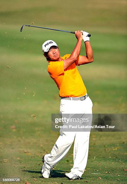 Yoshinobu Tsukada of Japan plays a shot during round four of the Asian Tour Qualifying School Final Stage at Springfield Royal Country Club on...