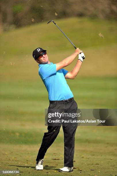 Thomas Petersson of Sweden plays a shot during round four of the Asian Tour Qualifying School Final Stage at Springfield Royal Country Club on...