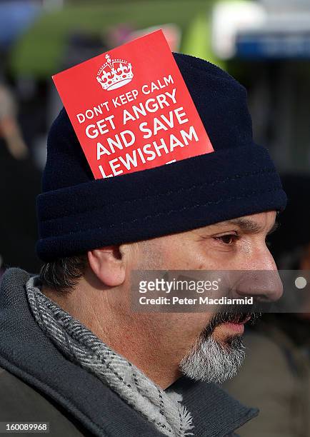 Man wears a message in his hat during a public demonstration against the closure of some services at Lewisham Hospital on January 26, 2013 in...