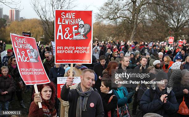 People take part in a public demonstration against the closure of some services at Lewisham Hospital on January 26, 2013 in Lewisham, London,...