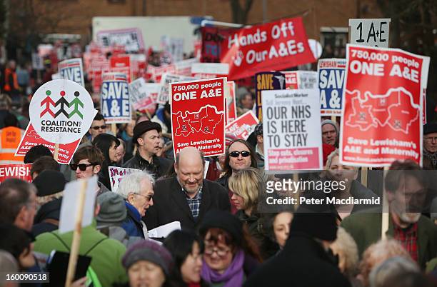 People take part in a public demonstration against the closure of some services at Lewisham Hospital on January 26, 2013 in Lewisham, London,...
