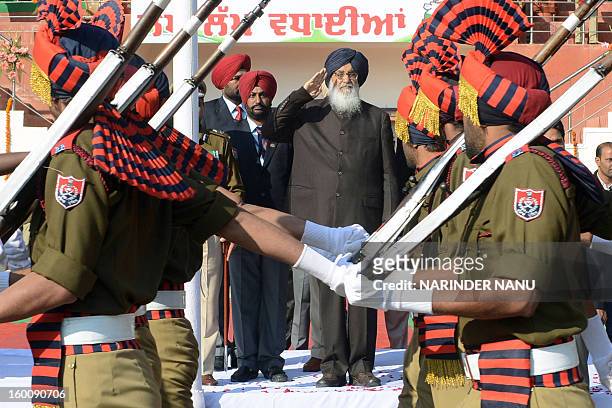 Indian Punjab stateChief Minister Parkash Singh Badal salutes during a ceremony to celebrate India's 64th Republic Day parade at The Guru Nanak...