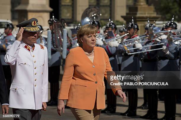 German Chancellor Angela Merkel arrives at La Moneda presidential palace in Santiago for a meeting with Chilean President Sebastian Pinera as part of...