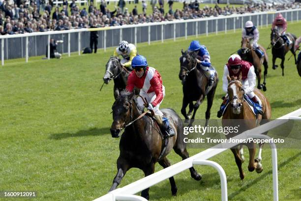 Irish Jockey Kieren Fallon riding Funfair winning the Hambleton Rated Stakes at York, 14th May 2003. Placed second Italian Jockey Frankie Dettori...