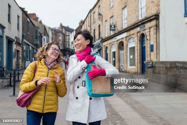 exploring fashion and friendship in the city center - county durham stock pictures, royalty-free photos & images