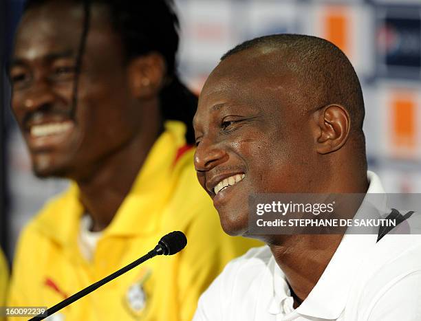 Ghana's national football team head coach Kwesi Appiah , flanked by midfielder Derek Boateng, give a press conference at Nelson Mandela Bay Stadium...