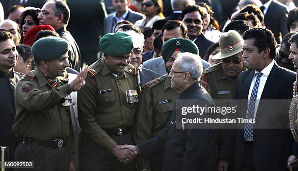 President of India Pranab Mukherjee meets invitees at Rashtrapati Bhavan on Republic Day on January 26, 2013 in New Delhi, India. India marked its...