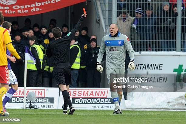 Marcus Rickert of Osnabrueck receives a red card from referee Guido Winkmann during the Third league match between VfL Osnabrueck and Karlsruher SC...