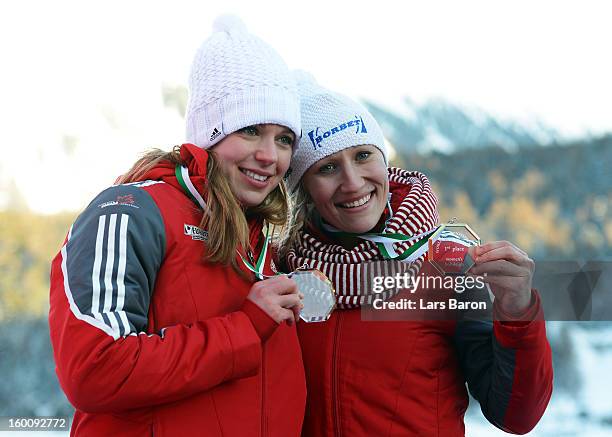 Kaillie Humphries and Chelsea Valois of Canada celebrates with the medals after the Women's Bobsleigh final heat of the IBSF Bob & Skeleton World...