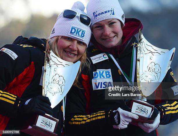 Third placed Sandra Kiriasis and Franziska Bertels celebrate after the Women's Bobsleigh final heat of the IBSF Bob & Skeleton World Championship at...