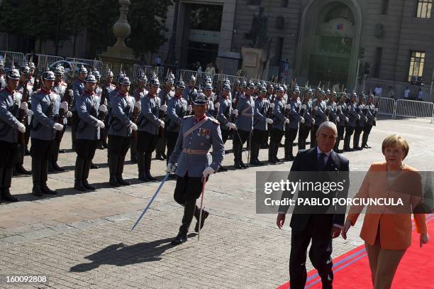 German Chancellor Angela Merkel arrives at La Moneda presidential palace in Santiago for a meeting with Chilean President Sebastian Pinera as part of...