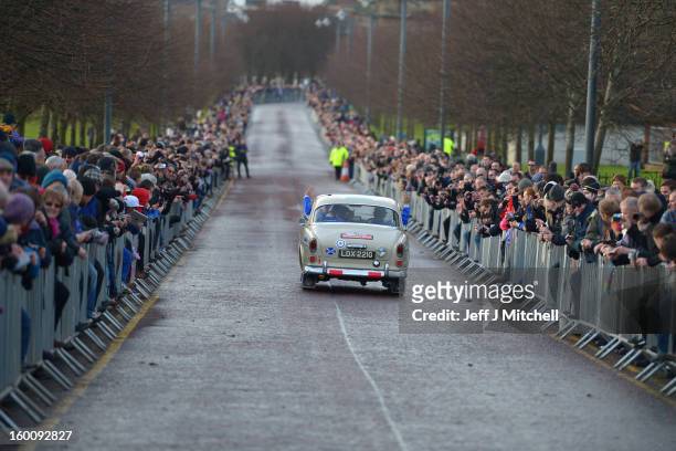 Drivers and their classic cars leave Glasgow at the start of the Monte Carlo Classic Rally on January 26, 2013 in Glasgow. Around 100 cars set off...