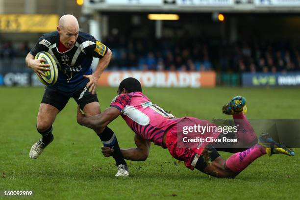 Peter Stringer of Bath is tackled by Watisoni Votu of Exeter Chiefs during the LV= Cup match between Bath and Exeter Chiefs at the Recreation Ground...