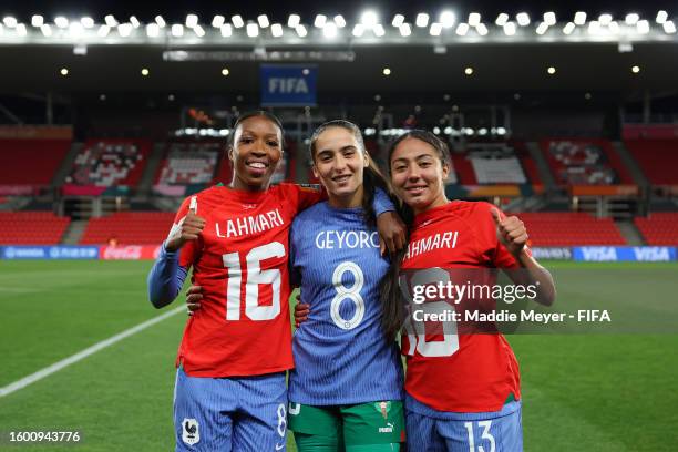 Grace Geyoro of France, Anissa Lahmari of Morocco and Selma Bacha of France pose after the FIFA Women's World Cup Australia & New Zealand 2023 Round...