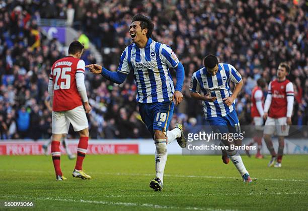 Leonardo Ulloa of Brighton & Hove Albion celebrates as he scores their second goal with a diving header during the FA Cup with Budweiser Fourth Round...
