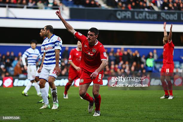 Darren Potter of Milton Keynes Dons celebrates scoring his sides fourth goal during the FA Cup with Budweiser Fourth Round match between Queens Park...