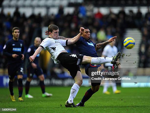 Colin Kazim-Richards of Blackburn Rovers battles with Mark O'Brien of Derby County during the FA Cup with Budweiser Fourth Round match between Derby...