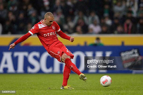 Dani Schahin of Duesseldorf shoots a goal per penalty during the Bundesliga match between VfL Borussia Moenchengladbach v Fortuna Duesseldorf at...