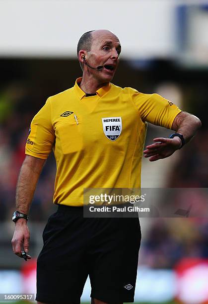 Match referee Mike Dean is seen during the FA Cup with Budweiser Fourth Round match between Queens Park Rangers and Milton Keynes Dons at Loftus Road...