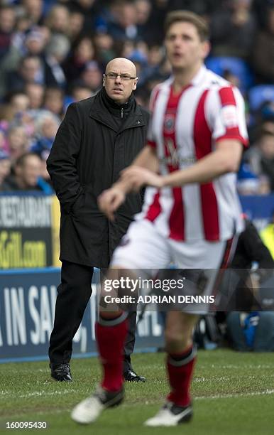 Reading's English manager Brian McDermott looks on during the FA Cup fourth round football match between Reading and Sheffield United at the Madejski...