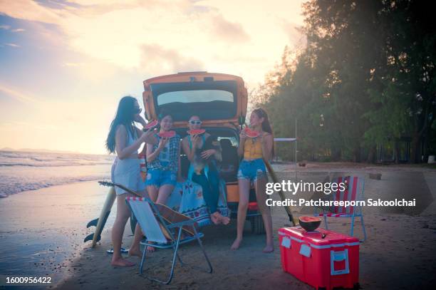 beach activity - drunk asian women stock pictures, royalty-free photos & images