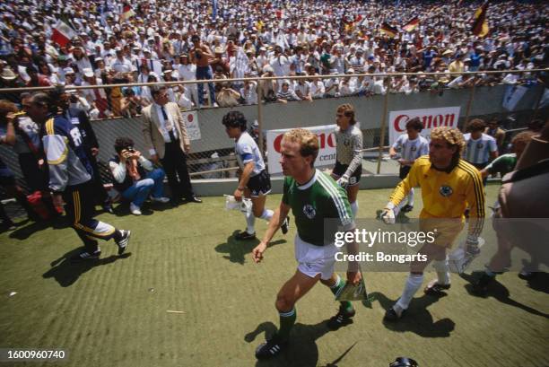 German footballer Karl-Heinz Rummenigge and German goalkeeper Harald Schumacher and Argentine footballer Diego Maradona and Argentine goalkeeper Nery...