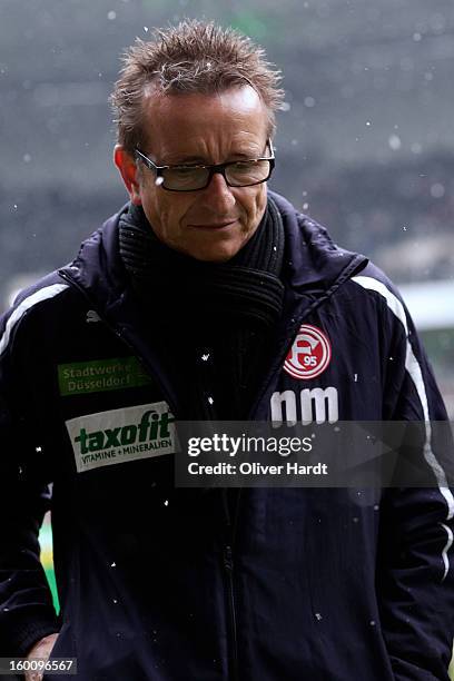 Head coach Norbert Meier of Duesseldorf looks on prior the Bundesliga match between VfL Borussia Moenchengladbach v Fortuna Duesseldorf at Borussia...