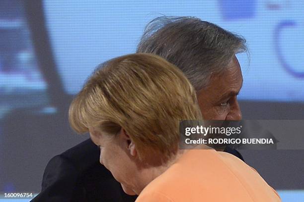 German Chancellor Angela Merkel and Chilean President Sebastian Pinera are pictured during the IV Business Meeting being held in Santiago in the...