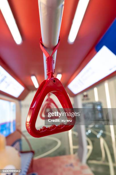 red handrail pull ring on the bus - handle stock pictures, royalty-free photos & images