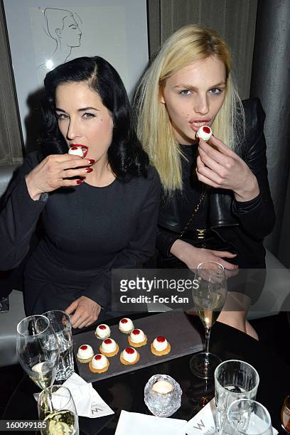 Dita Von Teese and Andreas Pejic attend the 'Body Double' Ali Mahdavi Exhibition Preview Cocktail At Hotel W on January 25, 2013 in Paris, France.