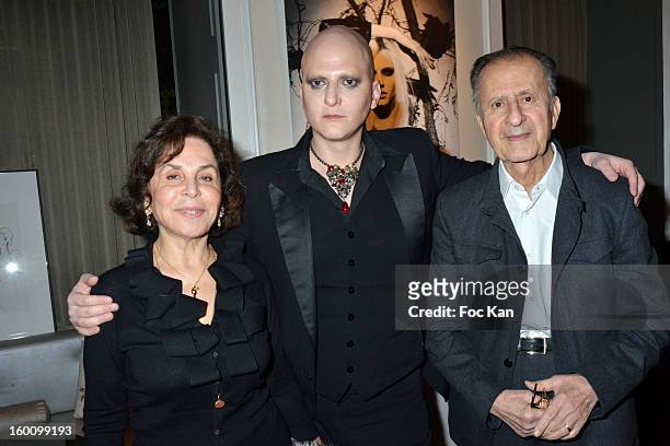 Ali Mahdavi beetween his mother and his father attend the 'Body Double' Ali Mahdavi Exhibition Preview Cocktail At Hotel W on January 25, 2013 in...