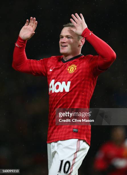 Wayne Rooney of Manchester United celebrates scoring his team's second goal during the FA Cup with Budweiser Fourth Round match between Manchester...