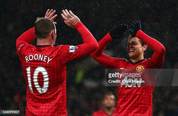 Javier Hernandez of Manchester United celebrates scoring his team's third goal with team-mate Wayne Rooney during the FA Cup with Budweiser Fourth...