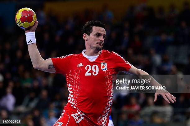 Croatia's Ivan Nincevic shoots during the 23rd Men's Handball World Championships bronze medal match Slovenia vs Croatia at the Palau Sant Jordi in...